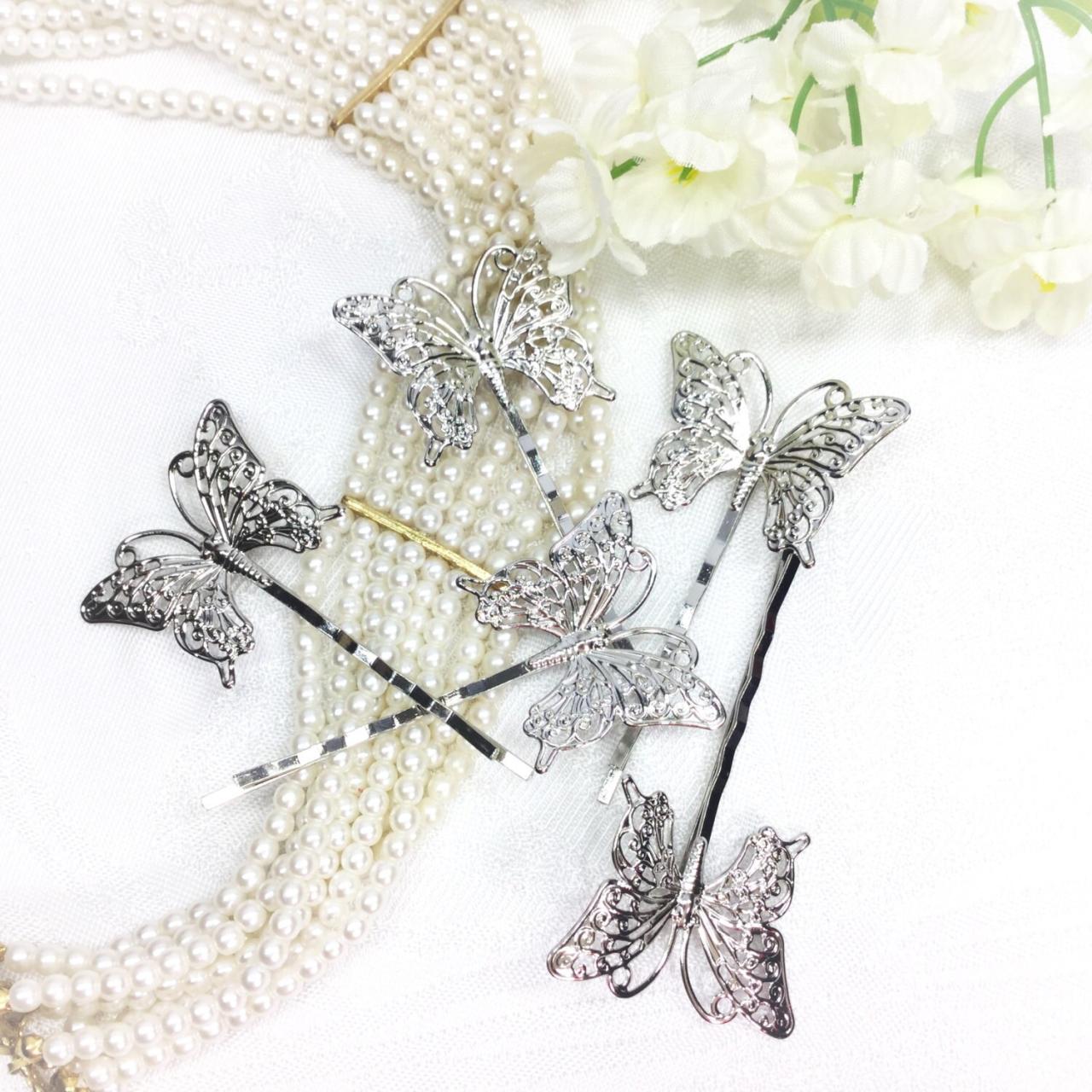 Silver butterfly hair clips