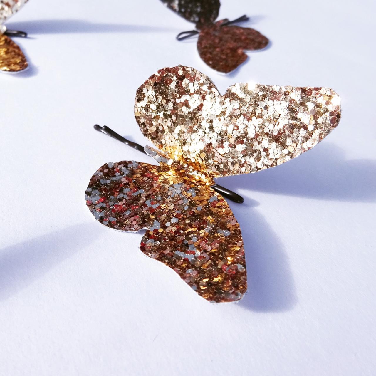 Gold butterfly hair clips